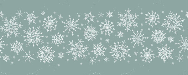 Naklejka na ściany i meble Beautiful hand drawn snowflakes seamless pattern, fragile winter background, great for textiles, banners, wallpaper, wrapping - vector design