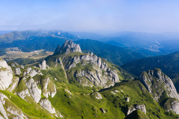 Obraz premium Most scenic mountain from Romania, Ciucas mountains in summer - drone view.