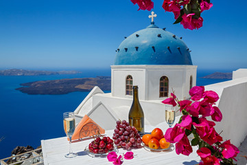 Wine and fruit for two on  the island of Santorini.