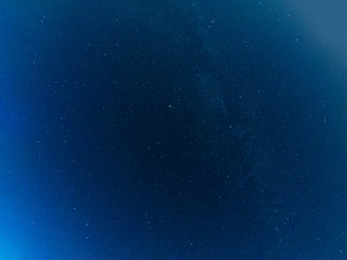 Starry night sky with satellites, milky way and galaxy