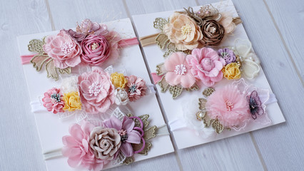 Bouquet of flowers made out of fabric cloth textile in beautiful soft pastel colors that can be used as hair accessory, decoration, and embellishment