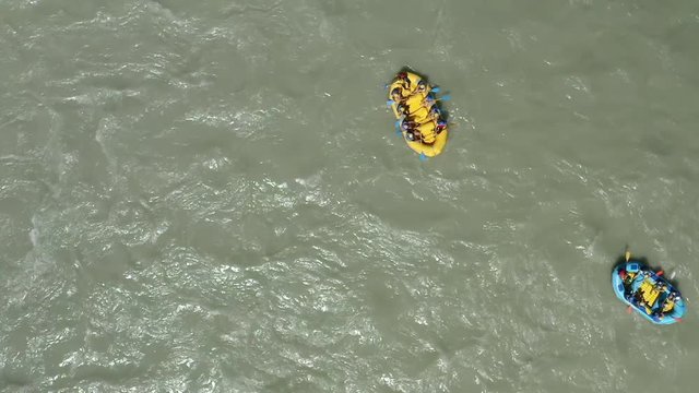 Adventure team doing rafting on the cold waters of the Katun River in Altai. slow motion