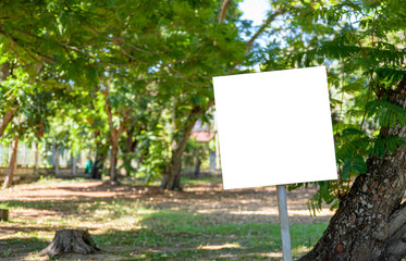 Blank white mock up or billboard banner for advertising at the park or the garden.