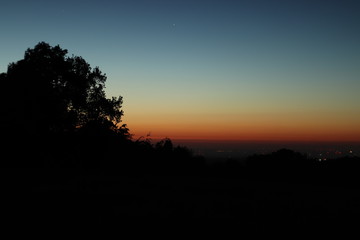 Fototapeta na wymiar Sonnenaufgang in der Eifel mit Blick über Städte Region Aachen