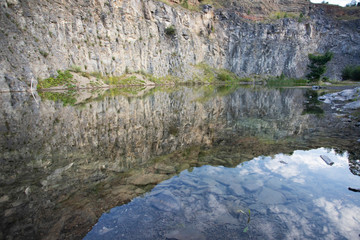 Fototapeta na wymiar Small lake near volcanic crater in Racos village, Brasov county, Romania