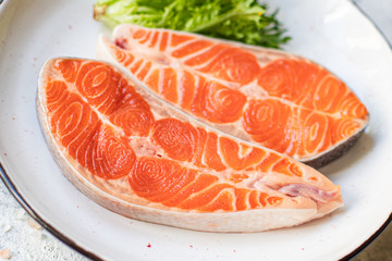 salmon red fish steak fillet seafood serving size portion product natural raw top view place copy space for text keto or paleo diet pescetarian
