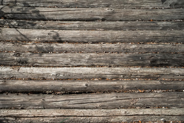 Natural wooden surface, texture. Rustic wooden horizontal wood planks with cracks, scratches for background, copy space