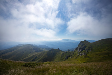 Most scenic mountain from Romania, Ciucas mountains in summer mist.
