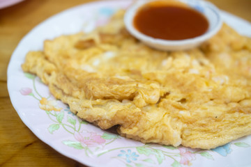 Crispy fried white crab meat omelette served with hot chili sauce
