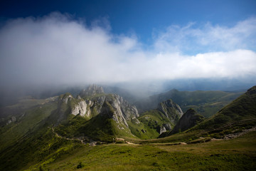 Most scenic mountain from Romania, Ciucas mountains in summer mist.