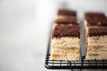 cake cut into pieces on a black board