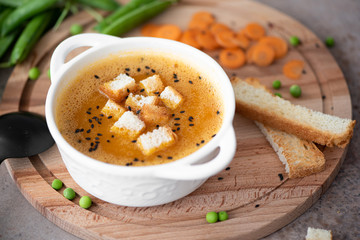 carrot and green pea puree soup with croutons