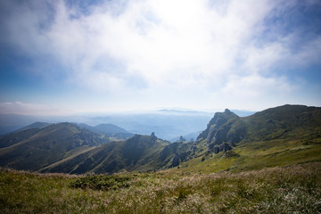 Most scenic mountain from Romania, Ciucas mountains in summer mist.