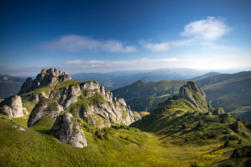 Naklejka premium Most scenic mountain from Romania, Ciucas mountains in summer mist.