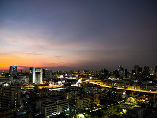 Obraz premium Crossed tollways around Victory monument, center of Bangkok city after sunset
