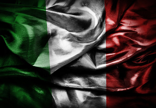 Grunge Italy flag on silk background