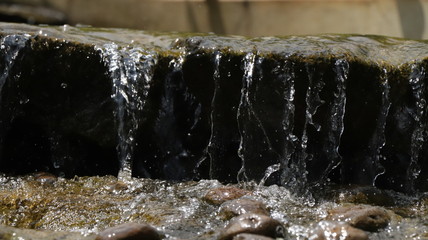 water flowing from a fountain