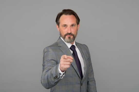 Businessman serious boss pointing at camera, appeal to society concept
