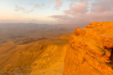 Fototapeta na wymiar Sunrise view of cliffs and landscape in Makhtesh (crater) Ramon