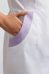 model in clothes for a doctor on a white background
