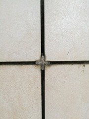 Fototapeta premium Tile texture work done on walls using tiles and spacers between.