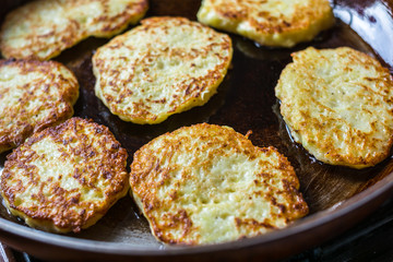 homemade zucchini pancakes in a pan