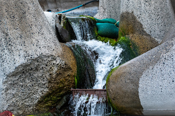water flowing into the waterfall