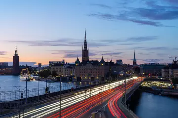 Wandcirkels aluminium skyline van Stockholm bij nacht © Frederick