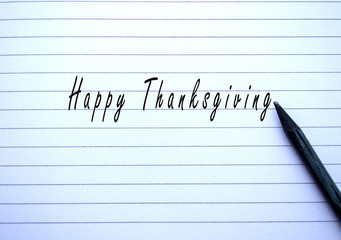 Happy thanksgiving lettering on paper.