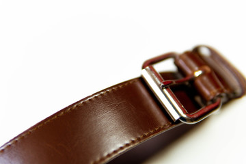 Brown leather belt, with metal buckle, lifestyle, fashion
