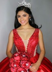 quinceañera girl in pretty red dress