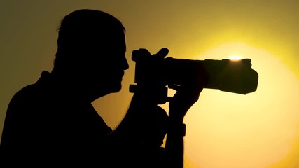 Photpgrapher Capturing The Light - Powered by Adobe