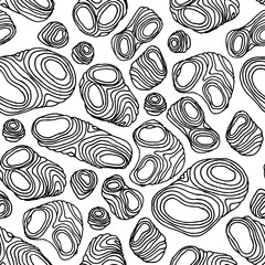 Hand-drawn seamless pattern of stylized stones of different sizes. Black and  white graphic isolated on white background. Idea for packaging, wallpaper, textiles.