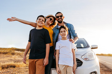 Family road trip. Latin family traveling locally by car.