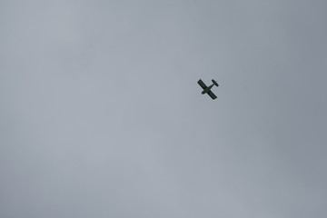 Plane flying away in the sky