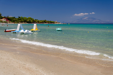 Picturesque golden sandy beach in Tsilivi situated on the east of Zakynthos island on Ionian Sea, Greece.