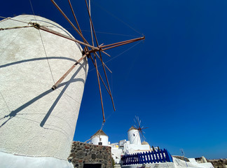 windmill in oia santorini greece