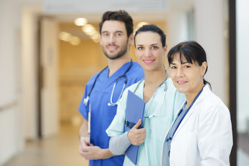 portrait of doctors and nurse on the corridor