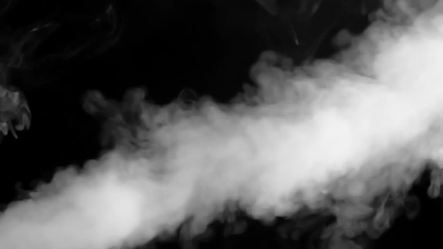 Jet of white smoke on a black background. CO2 pollutant emission  the atmosphere in  infrared camera