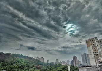 Fototapeta premium clouds over city