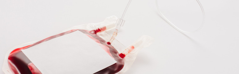 blood donation package with blank label on white background, panoramic shot