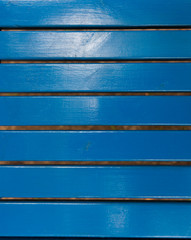 Blue background. For the presentation of a bright building or a colorful project for the construction of houses made of wood.