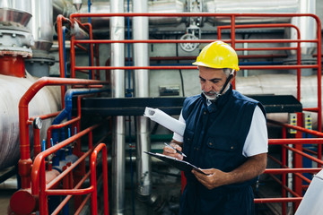 middle aged industry worker working indoor