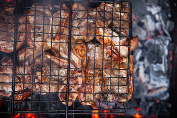 Igniting coal with a gas burner. Preparation of coals for barbecue