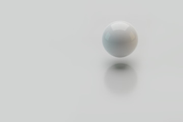 3d ball levitates in the air with a shadow on a white background.