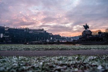 Colorful Sunrise burning sky Koblenz City historic monument German Corner where river rhine and...