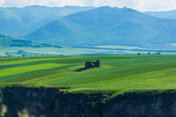 Rural landscape with field and mountains, Armenia
