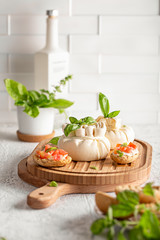 
burrata cheese with fresh tomatoes and basil