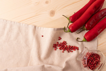 red chili spicy pepper on rustic surface