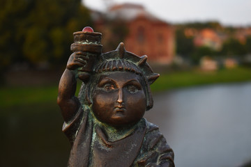 mini sculpture near the river